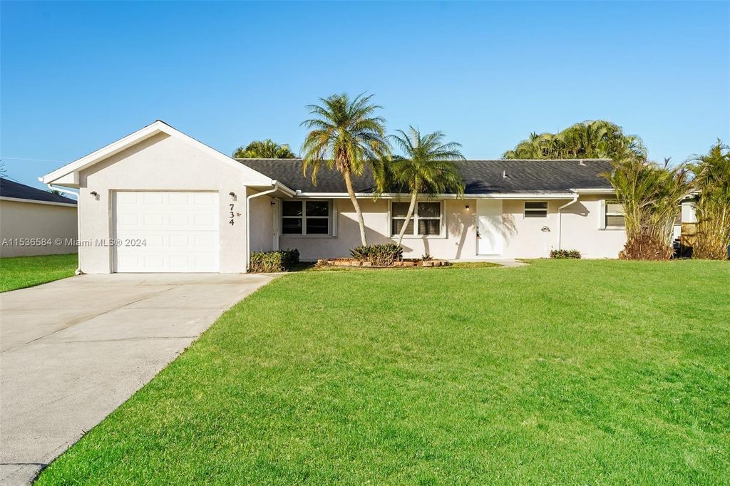 Photo of 734 SW Avens St, Port Saint Lucie, FL 34983 (MLS # A11536584)
