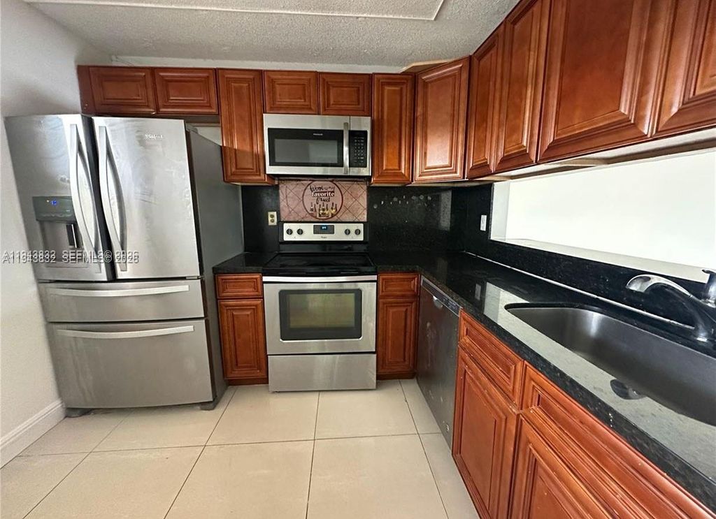 Photo of 3396 Foxcroft Rd #305, Miramar, FL 33025 (MLS # A11943832)