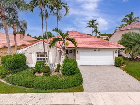 Photo of 12683 NW 11th Pl, Sunrise, FL 33323 (MLS # A12106839)