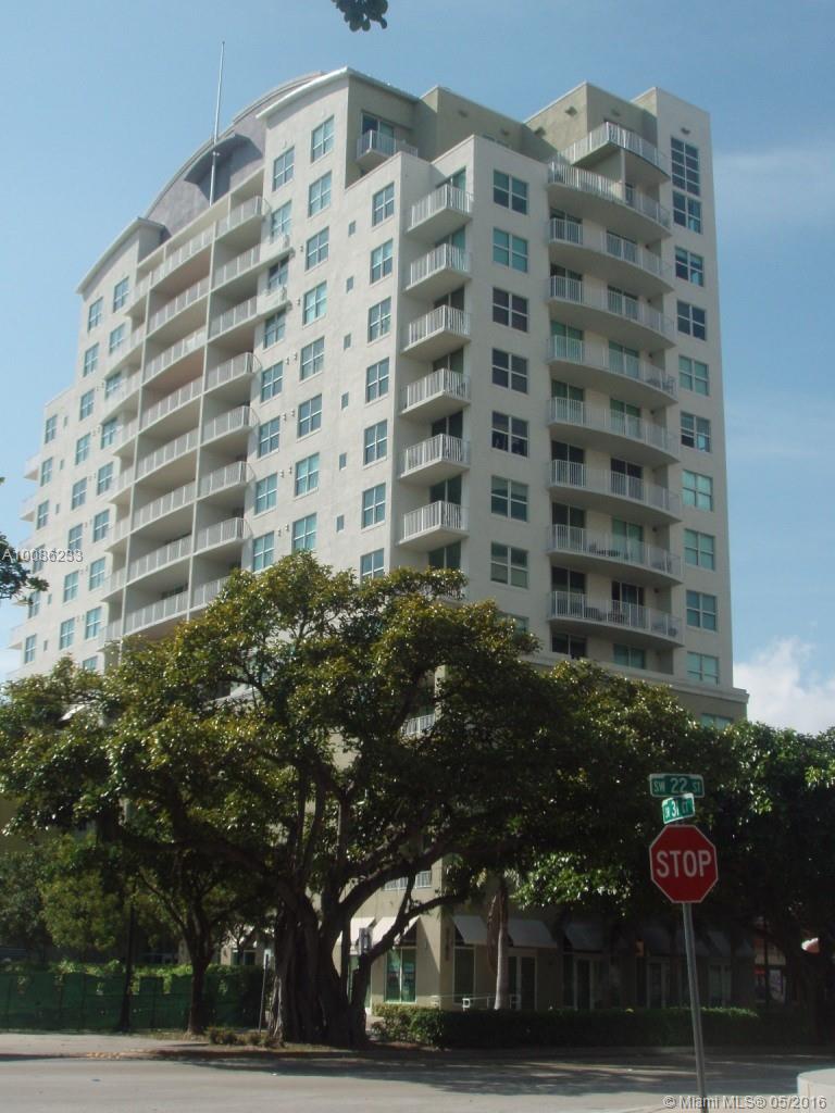 This unique 2/2 is unlike anything on the market. This corner unit features many exclusives - an island kitchen with all s/s appliances and granite counter-tops, several custom-made built-ins, a private entrance to the swimming pool, TWO parking spaces and a storage facility in he building, this unit has a wrap-around balcony.