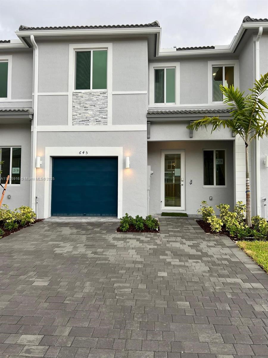 Be the first to live in this brand-new 3-bedroom, 3.5-bathroom townhome! Featuring a modern open-concept design, this home offers a gourmet kitchen with stainless steel appliances, quartz countertops, and space perfect for gatherings. The spacious primary suite boasts a walk-in closet and a spa-inspired bathroom. Enjoy the convenience of an attached 1-car garage, in-unit laundry, and a half bath for guests on the main floor. Ideally located near shopping, dining, schools, and major highways — this home combines style, space, and convenience in one perfect package.