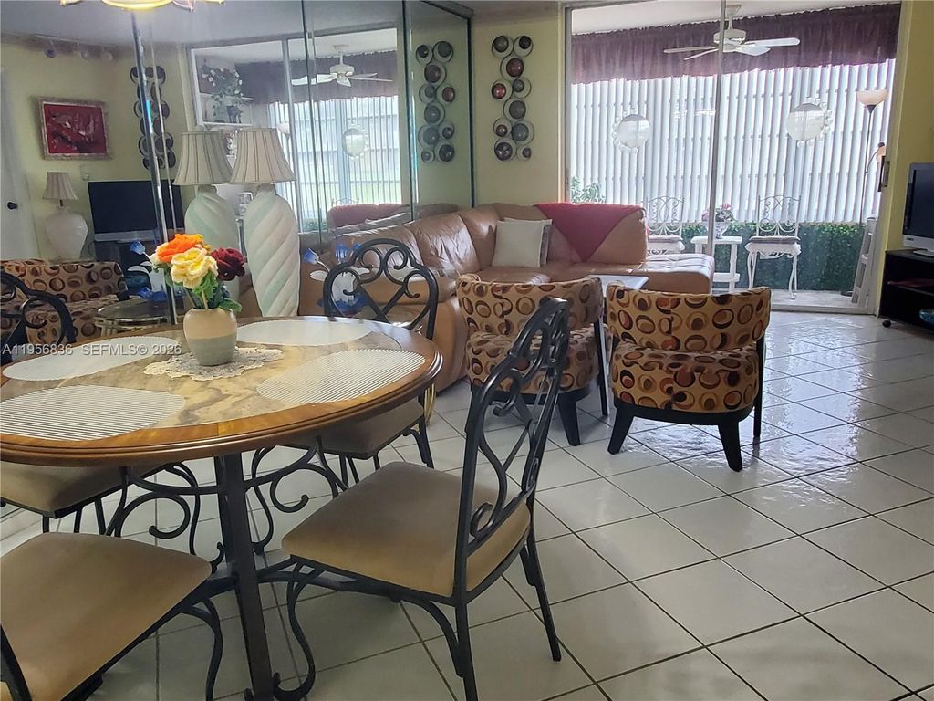 Photo of 9360 Sunrise Lakes Blvd #102, Sunrise, FL 33322 (MLS # A11956836)