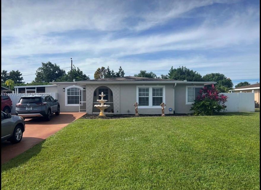 GREAT LOCATION !! BEAUTIFUL House 2/2 remodeled and ready to move with city water & sewer! This beautiful Lehigh Acres home features kitchen with granite countertops, modern cabinets, and high-end appliances, tile flooring throughout, updated bathrooms, fresh interior/exterior paint, and a spacious laundry room with washer/dryer. Offers 2 bedrooms, 2 bathrooms, plus a second kitchen outside, family room perfect for entertaining. The fenced backyard includes a terrace, 2 shed and space for a pool, garden with mango and avocato tree, with no HOA and no flood zone. Roof replace 2025 new A/C 2023 A must-see!