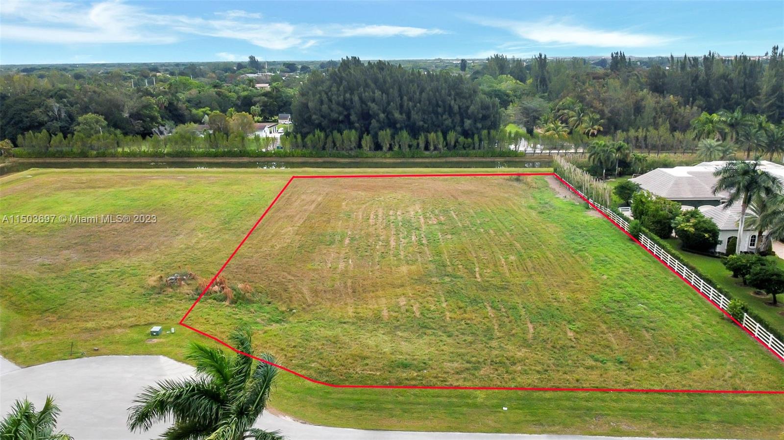 Discover the pinnacle of exclusivity in Southwest Ranches with this premium vacant lot in the prestigious Landmark Ranch Estates, the area's only gated community. Nestled in an idyllic cul-de-sac with a serene rear canal, this south-facing gem ensures optimal sunlight throughout the day, enhancing its allure. Unique among its peers, this lot is privately owned, freeing you to choose your preferred developer & architect to bring your dream estate to life. Included are full plans, soil tests, and preliminary approvals from the Health Department and Broward County, ensuring a smooth start to your building journey. Seize this rare opportunity to create your sanctuary in a coveted location.