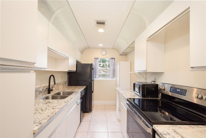 Welcome to this beautifully updated 1-bedroom, 2-bathroom home located in the highly desirable High Point of Delray West community. This move-in-ready gem offers the perfect blend of comfort, style and convenience. Step inside to find a spacious open layout with elegant tile flooring, recessed lighting and a modern kitchen featuring updated cabinetry and granite countertops. Both bathrooms have been beautifully renovated with high-end finishes, offering a touch of luxury. Enjoy your morning coffee in the bright Florida room or entertain friends in the spacious dining and living area. This active 55+ community features amenities like a clubhouse, pool, shuffleboard, and social activities—all just minutes from downtown Delray Beach, world-class restaurants, golf courses and shopping!