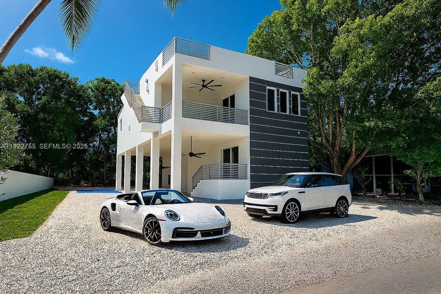 Brand NEW Custom-built masterpiece in the making located in Key Largo 1-hour from Miami. A crafted and luxurious 2 story stunning estate with a rooftop deck built with unyielding strength of concrete construction and plumb elevation for peace of mind, captivating high ceilings, quality impact windows and doors. Features 4 bedrooms, 3 bathrooms, custom cabinetry, quartz countertops, European flooring, walk-in laundry room, built-in closets and the finest details throughout the residence. A large tranquil lot to soak up the sun in your lush pool. An outdoor kitchen/BBQ are for social entertaining, or breathtaking, and serene ocean sunset views from your rooftop deck. Every detail was meticulously designed to indulge in island living without the constraints of an HOA