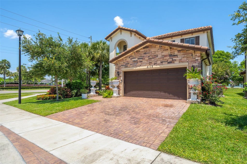 Photo of 5113 NW 52nd St, Tamarac, FL 33319 (MLS # A12000650)