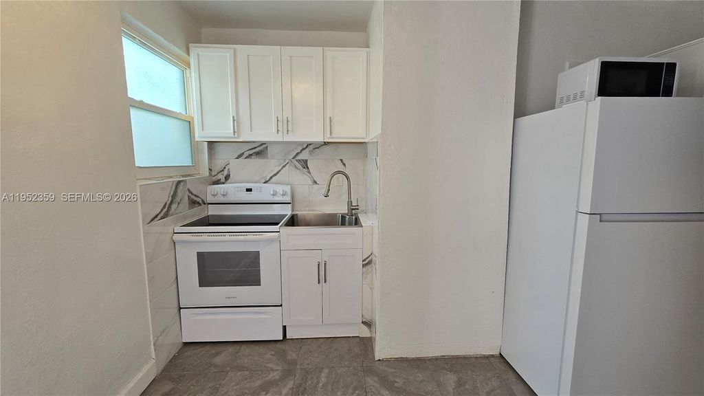 Photo of 9680 NW 19th Pl, Sunrise, FL 33322 (MLS # A11952359)