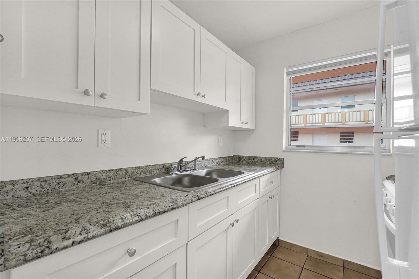 ROYAL PALM GARDENS CONDO - Residential