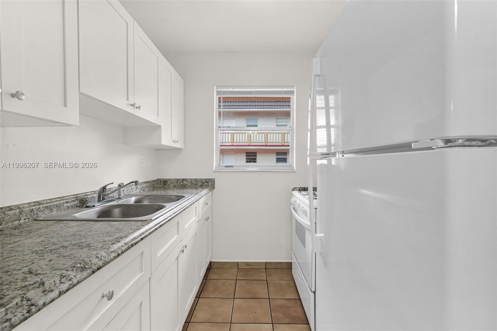 ROYAL PALM GARDENS CONDO - Residential