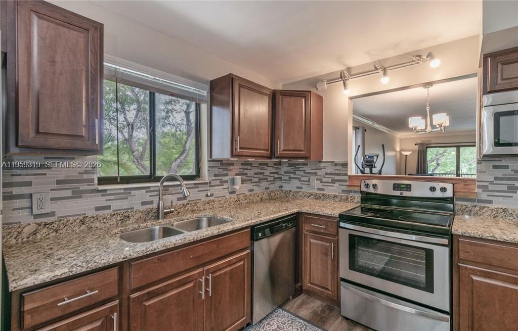 Photo of 402 Lakeview Dr #201, Weston, FL 33326 (MLS # A11959319)