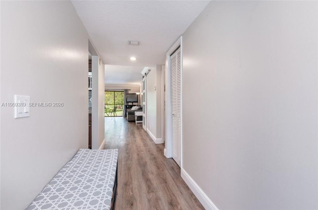 Photo of 402 Lakeview Dr #201, Weston, FL 33326 (MLS # A11959319)