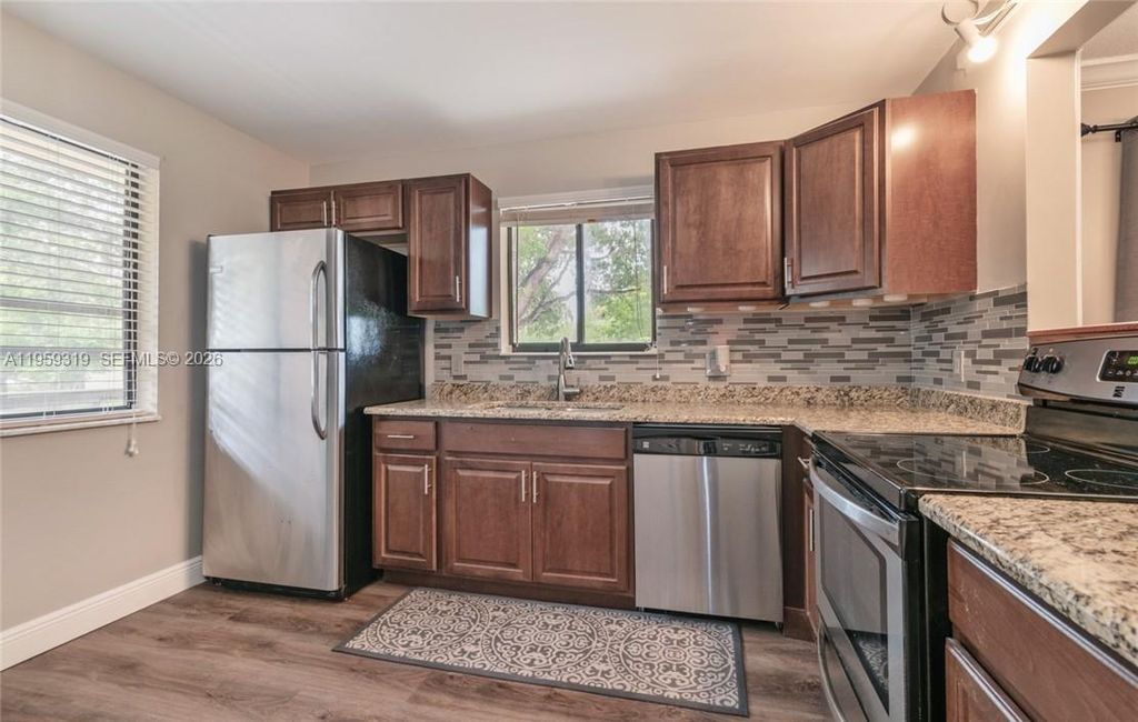 Photo of 402 Lakeview Dr #201, Weston, FL 33326 (MLS # A11959319)