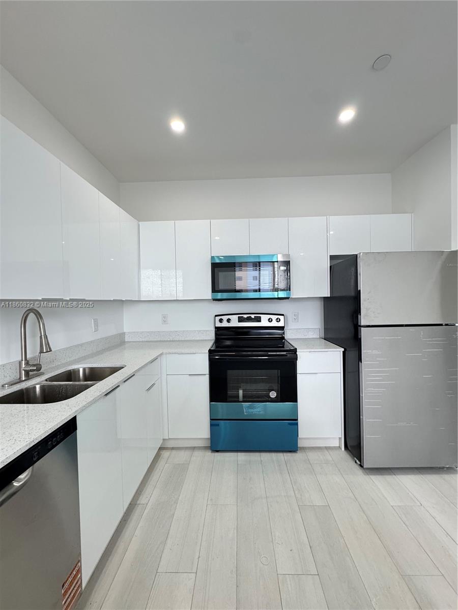 Be the first one to live in this brand new 2-bedroom 2-bathroom apartment located in Hialeah! Promotion: $2,600 per month with the first month free on a 15-month lease. State of the Art Building with 12 brand-new 2-bedroom, 2-bathroom apartments ready to move in. Credit 620+: 1st month + 1 month security deposit. Credit 619 or less: 1st month + 2 months' security deposit. Each apartment features In-Unit Washer & Dryer, Stainless Steel Appliances, and Granite Countertops. Building is Pet-friendly and has a high-speed Elevator and secured code access lobby. Exciting New Urban Area with Metro Rail & Tri-Rail Stations one block away. Free Bus and Private Car Service within the City of Hialeah! Schedule your tour today! Text/call listing agent for showing.