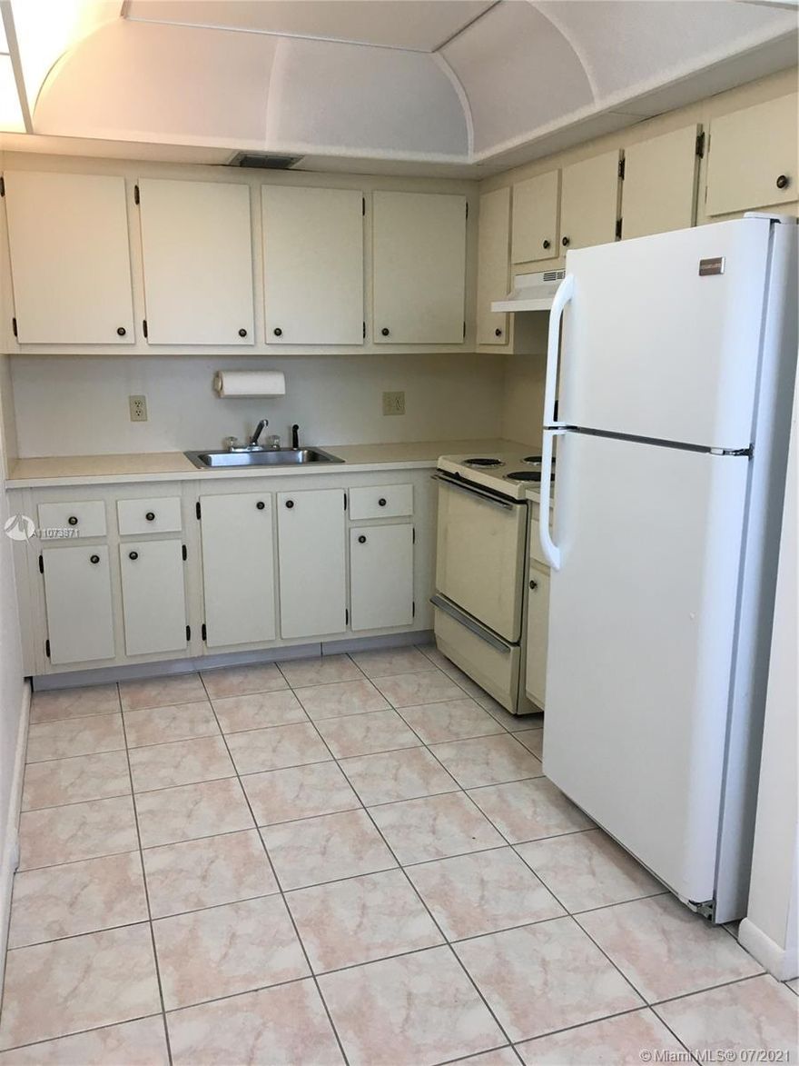 Century Village 2 bedroom 1 1/2 baths on the 4th floor. 55 yrs. and over community. Kitchen and dining room tiled, bedrooms and living room carpeted. Laundry facilities on each floor, ceiling fans in living room, dining and master bedroom. Like new bathrooms, very quiet apartment. Amazing clubhouse within walking distance. Sundry shop, medical facilities across the street from complex. Fire alarm, police and ambulance emergency system conveniently located on key pad in apartment.