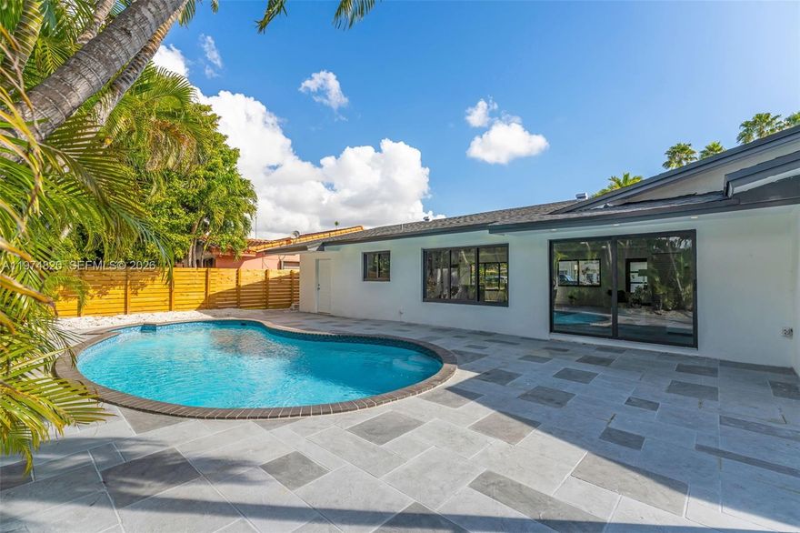 Welcome to your dream home! No details spared in this exquisitely renovated residence, perfect blend of luxury, comfort, and modern living. Featuring an open-concept floor plan with a fabulous chef’s kitchen boasting a stunning granite island, built in microwave, wine cooler, top-of-the-line appliances, and ample storage, this home is designed for both entertaining and everyday living. Natural light floods the home through newly installed impact windows and doors (2024), creating a bright and inviting atmosphere. The brand-new roof (2025) ensures long-term durability. Step outside to a breathtaking backyard oasis with an upgraded patio with pavers, a beautiful pergola, and a fully equipped barbecue wet area, all overlooking a sparkling swimming pool. The circular asphalt driveway provides secure and spacious parking. Ideally located with quick access to the Palmetto Expressway, Florida’s Turnpike, and just a short drive to South Miami and Coral Gables, this home offers the perfect balance of tranquility and connectivity. Move-in ready, with designer furniture, including patio pieces, available for negotiation. Don’t miss this rare opportunity to own a luxurious, turnkey property in a highly sought-after neighborhood. Schedule your private showing today!