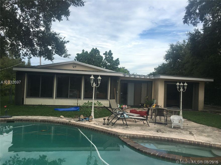 Great investor opportunity!  Single Family home turned into two units.  Prop easy to convert back to original layout if you wanted as single family home.  Beautiful lot with pool, on the lake with deck, storage w/ bathroom as a change room for pool.  Large lot, with Avocado tree in the front.  Can't ask for more, deck, lake and pool, perfect home for a fist time home buyer or that buyer that's looking to make it their own.  Also great rental income property for investors.  Come see now!! Won't last!!