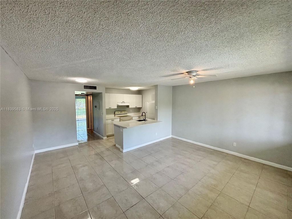Photo of 1822 Meadows Cir W #1822, Boynton Beach, FL 33436 (MLS # A11839583)