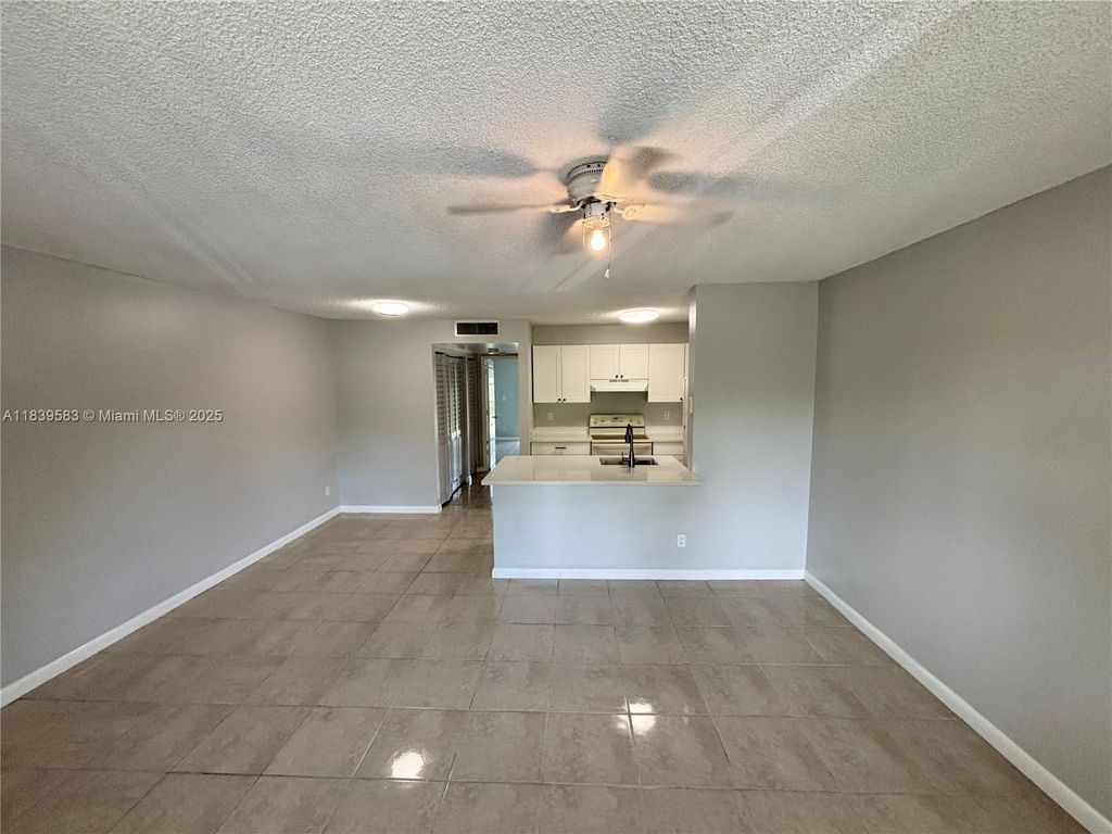 Photo of 1822 Meadows Cir W #1822, Boynton Beach, FL 33436 (MLS # A11839583)