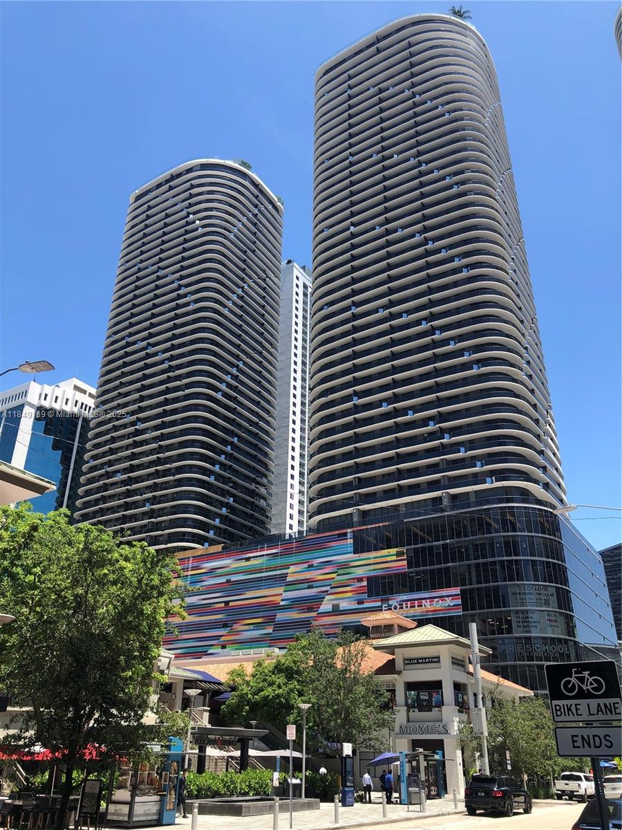 Live in the heart of Brickell. 1 bedroom + DEN (can be used for guests or as an office), 2 FULL BATHROOMS!!!, top of the line kitchen appliances. Enjoy 5 stars amenities: landscaped 9th floor pool terrace and a rooftop pool with ocean views, mini golf area, movie theater, business center, spa, children playroom, sauna, jacuzzi, steam room, fitness center, Concierge Service, 24 hour valet, security, mail receiving desk, and much more. HOA includes internet, cable, water & 1 parking space (valet). Steps away from Brickell City Center, Mary Brickell Village and Metrorail and Metromover stations.