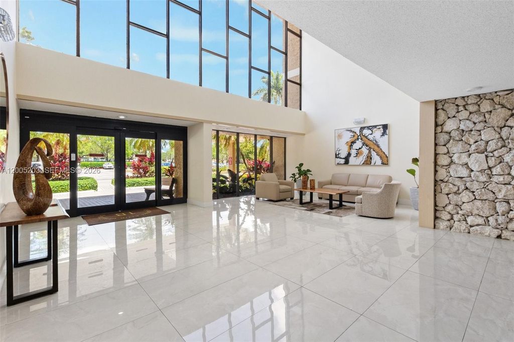 Photo of 16400 Golf Club Rd #104, Weston, FL 33326 (MLS # A12005203)