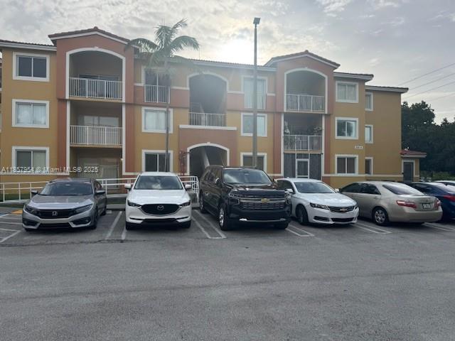 Spacious 3BR/2BA condo, freshly painted throughout and move-in ready! Enjoy a large covered balcony/patio perfect for entertaining with serene lakeside views. Bright open living areas, separate storage room for all your personal items, comfortable layout for your family. Interior laundry room with washer and dryer. Prime location off Old Cutler Rd, close to Black Point Marina, top restaurants, shopping and excellent schools. Lush surroundings make this a perfect place to call home. This unit is located on the third floor, quiet community with 2 parking spaces provided. Perfect area to bike and walk to the marina or schools nearby. Plenty of room for kids to play on beautiful lawns around the lake and community.