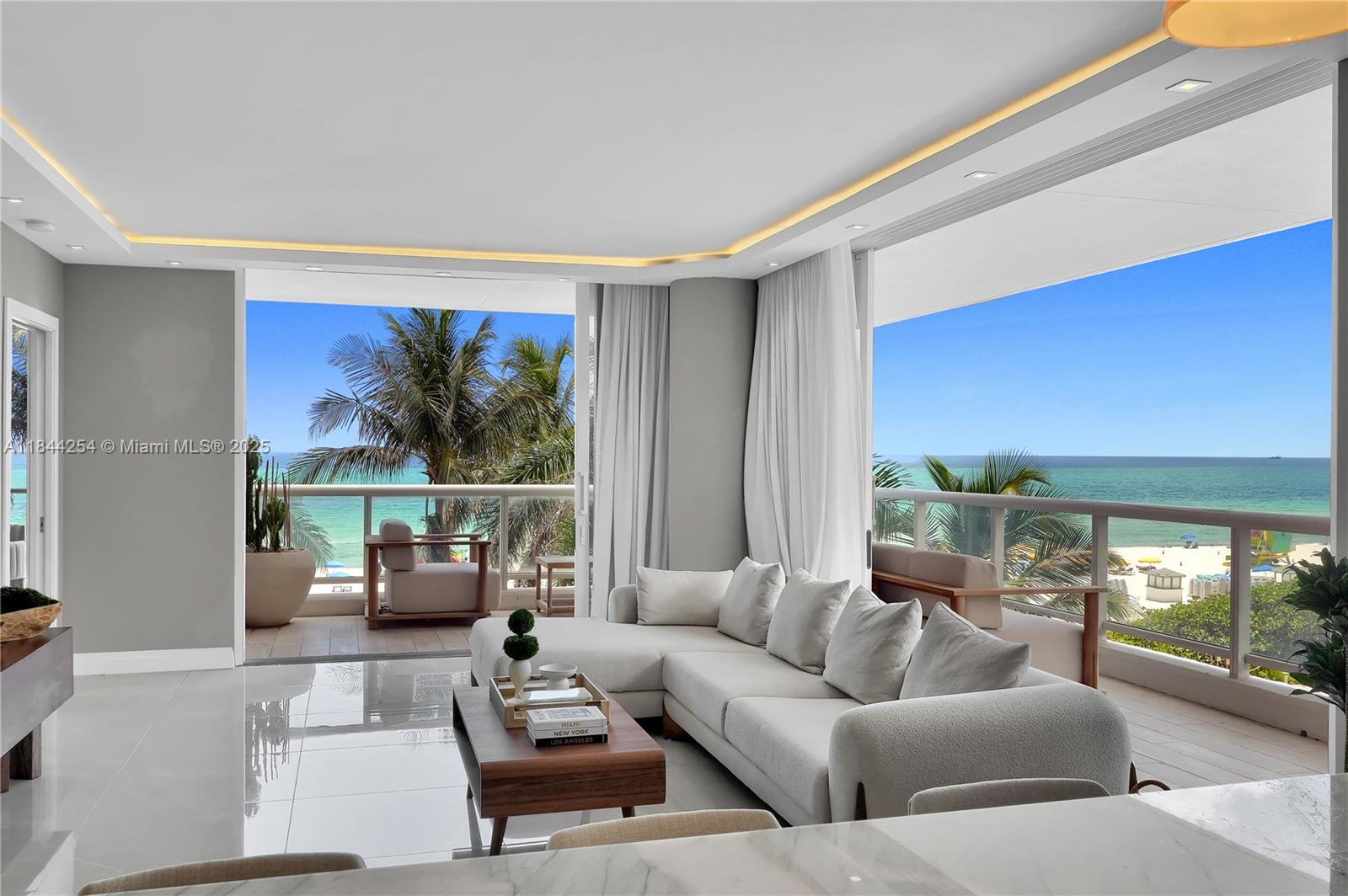 Live in oceanfront luxury at this fully renovated 2BD/2BA condo in La Tour. Perched on the southeast corner, it boasts direct ocean views from key living spaces. New extra-wide hurricane impact sliding doors seamlessly connect to a wrap-around balcony. Features include Italian porcelain floors and same-floor garage parking. La Tour, a recently remodeled boutique building with 63 units, offers beach service, pool, Jacuzzi, sauna, gym, tennis court, meeting/party room, 24-hour security, and on-site management. With just 3 apartments per floor, it ensures privacy and exclusivity. Ideally located near hotels, restaurants, and shops, this property is a must-see for those seeking coastal elegance and convenience.