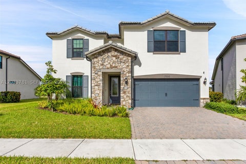 Photo of 7700 NW 84th Ln, Tamarac, FL 33321 (MLS # A12033781)