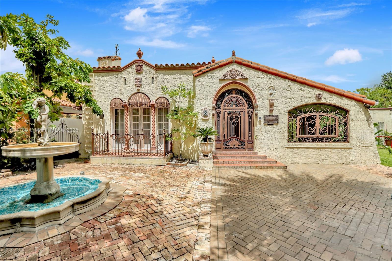 Discover timeless elegance with this stunning Old Spanish-style home, rich in character and architectural detail. Situated on a huge corner lot with a guest house, the property offers exceptional privacy with a completely walled-in yard, creating your own serene oasis. From the arched doorways to the charming stucco and fountains, this residence radiates classic charm. A rare opportunity to own a piece of history on an expansive lot with endless potential. Perfect for entertaining, expanding, or simply enjoying the space and tranquility.