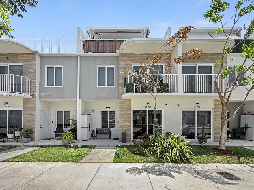 Step into modern living in this 2022 tri-level 4-bedroom, 3.5-bath townhouse featuring porcelain tile flooring and sleek finishes throughout. Enjoy shaded afternoons and effortless entertaining on the east-facing private covered rooftop deck, complete with a full gas summer kitchen. The first-floor bedroom with a private bath offers flexibility as an in-law suite, guest retreat, or potential income opportunity. Additional features include impact windows and doors, a reverse osmosis water filtration system, and stainless steel appliances. Filled with natural light and fully turnkey, this move-in ready home offers style, comfort, and convenience. For showings, please contact Mabel at (305) 315-6133.