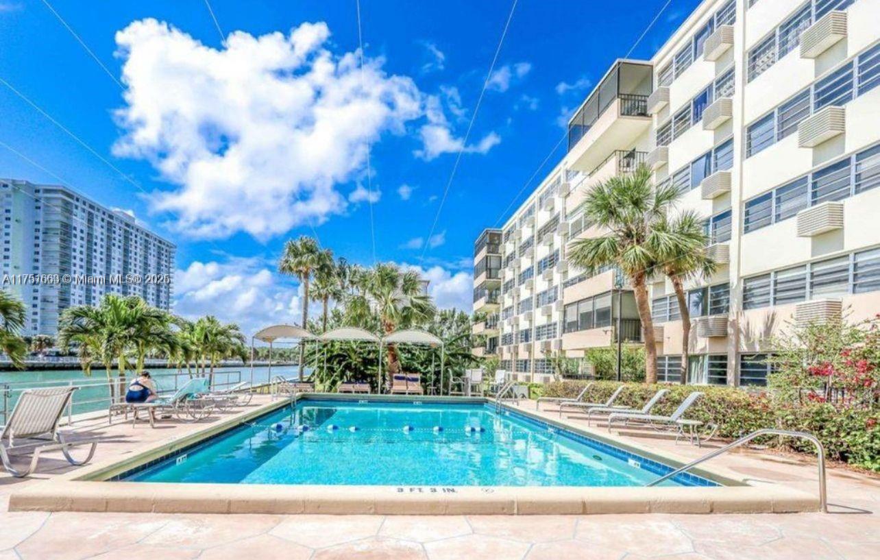 ATTENTION INVESTORS — Don’t miss this exceptional investment opportunity! Beautiful waterfront apartment in a prime location, just a short walk to the beach. Enjoy a serene, peaceful environment and stunning, unobstructed water views from the spacious balcony. Cable and WiFi included. This property offers not only immediate availability but also incredible future potential — with the possibility of a full building sale, positioning you for a projected $469K return on this unit within a year. A rare chance to invest wisely and profit significantly!