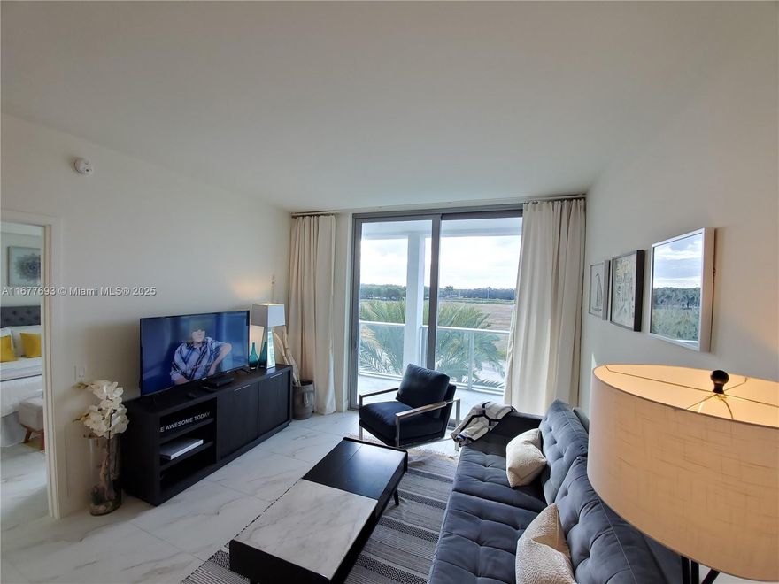 Fully & tastefully furnished with top of the line furniture, decorated & fully equipped for Airbnb short term rentals. Over $10K in furnishings included in sale, which increases the rent value.  Can rent for 90 days minimum 4 times a year, or can rent yearly. Great tenant in place since June 2023. Leased at $2,500 a month until 12/31/2025. Large 1/1 plus den unit with balcony. The den has a sofa bed for overnight guests. 2 LED TVs, decoration, silverware, cooking utensils, linen, everything you can imagine comes with it. Luxurious 2020 building, resort style amenities: state-of-the-art gym, spa, sauna, steam room, business center, kid's room, party room, club room, guest suite, infinity edge pool, elevated jacuzzi, BBQ area, 2 tennis courts, 24 hour security  ***AGENTS SEE BROKER REMARKS**