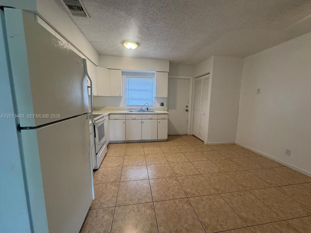 Photo of 1480 NW 19th Ct #1-2, Fort Lauderdale, FL 33311 (MLS # A12013463)