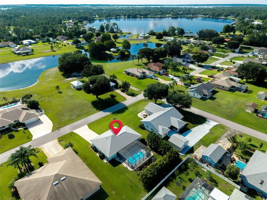 Bring your boat to this great waterfront community of Country Walk with its own marina on the shores of Lake Carrie with access to Lake June, & lake Henry, with no restriction & only $68 HOA fees! This clean & bright home built in 2019 still looks like new. Gorgeous salt pool in private screened porch. Great layout. Open floor plan. High ceiling. Immaculate landscape. 1 & half car garage. This tranquil setting on Lake Carrie, known for its Spring fed water &  sandy bottom is located in Lake Placid "the Town of Murals". A pathway around the community will lead you to an island with a covered gazebo for outdoor events. Club house is next to the marina. Dock space is $30 a month. This is a quiet community, surrounded by a forest full of trails, pure nature; it is not uncommon to see a deer.