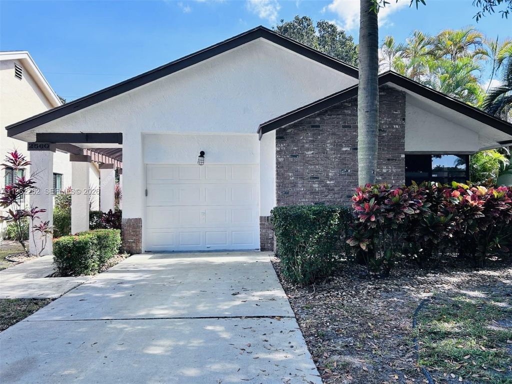 Photo of 2560 Calamondin Cir, Coconut Creek, FL 33063 (MLS # A11962262)