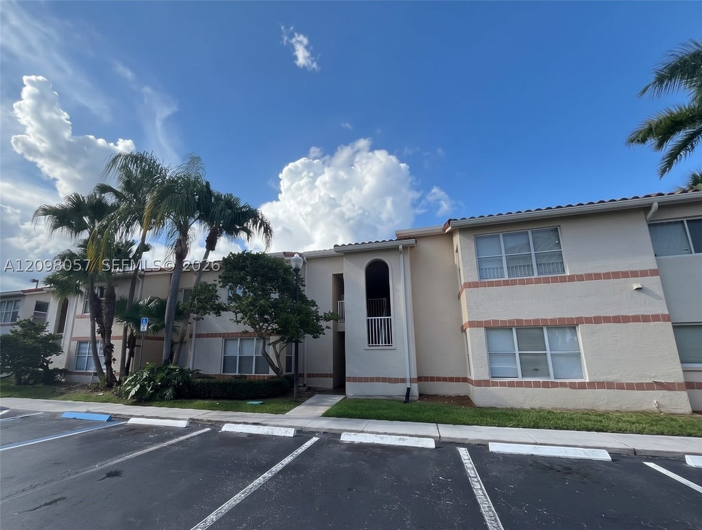 Photo of 3470 N Pinewalk Dr N #216, Margate, FL 33063 (MLS # A12098057)