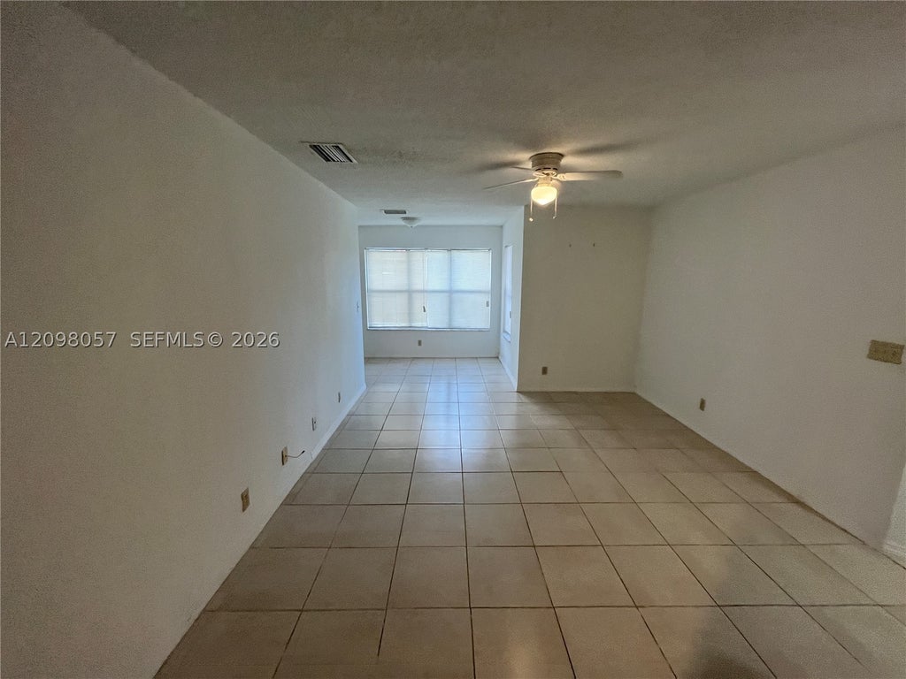 Photo of 3470 N Pinewalk Dr N #216, Margate, FL 33063 (MLS # A12098057)