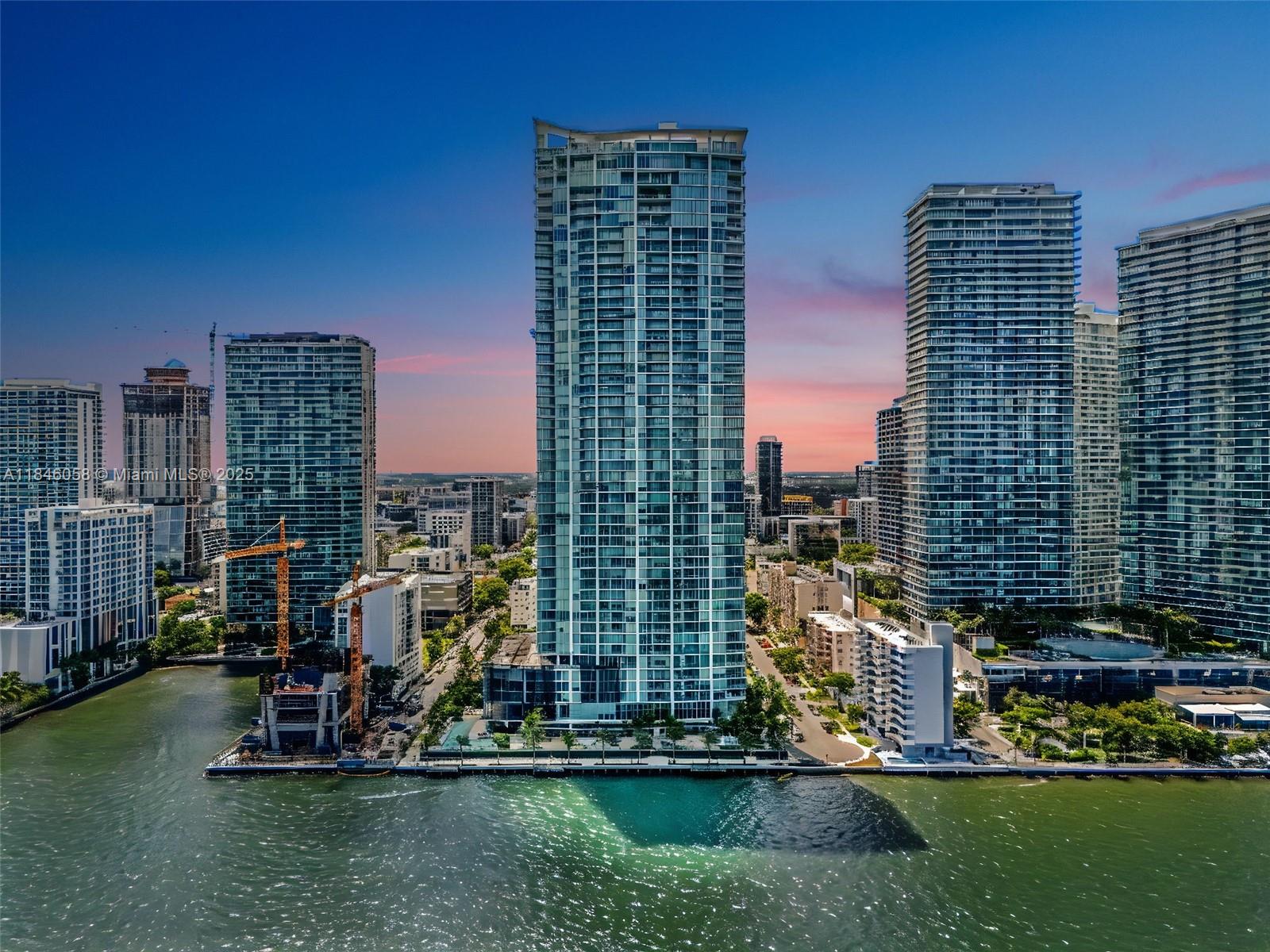 Now the lowest priced 3-bedroom on the highest floor! Experience jaw-dropping bay and skyline views from this designer-upgraded 3 bed + den, 4 bath corner residence — the most sought-after line in Edgewater.
Enjoy luxury living with a private elevator and foyer, beautiful lime washed walls, custom built-in closets, recessed lighting, electric shades, Italkraft Italian cabinetry, and top-of-the-line Miele appliances.
Resort-style amenities include two waterfront pools, a sand lounge with cabanas, tennis and basketball courts, beach volleyball, summer kitchen, state-of-the-art gym, kids’ play area, event and conference rooms, and more.
Includes 2 tandem parking spaces and storage cage.