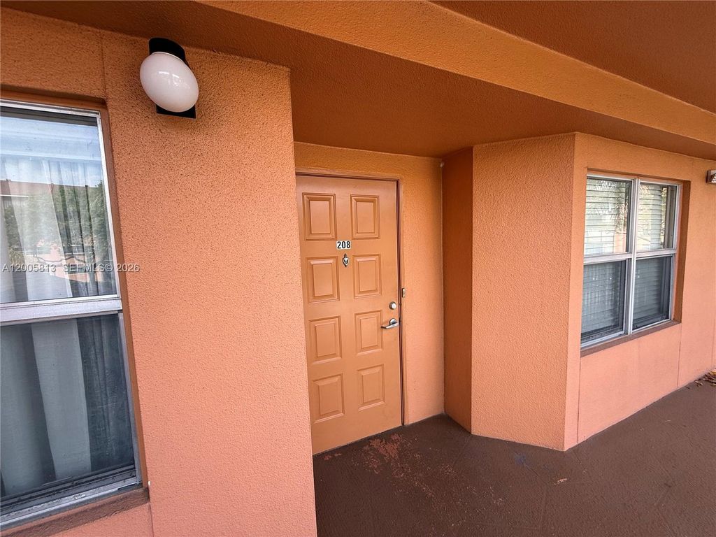Photo of 571 SW 141st Ave #208N, Pembroke Pines, FL 33027 (MLS # A12005813)