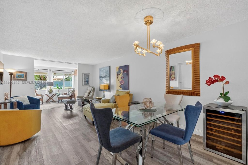 Photo of 9821 Sunrise Lakes Blvd #107, Sunrise, FL 33322 (MLS # A11992312)