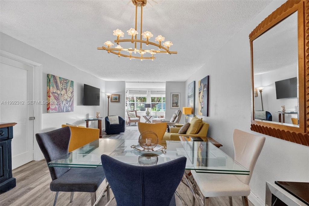 Photo of 9821 Sunrise Lakes Blvd #107, Sunrise, FL 33322 (MLS # A11992312)