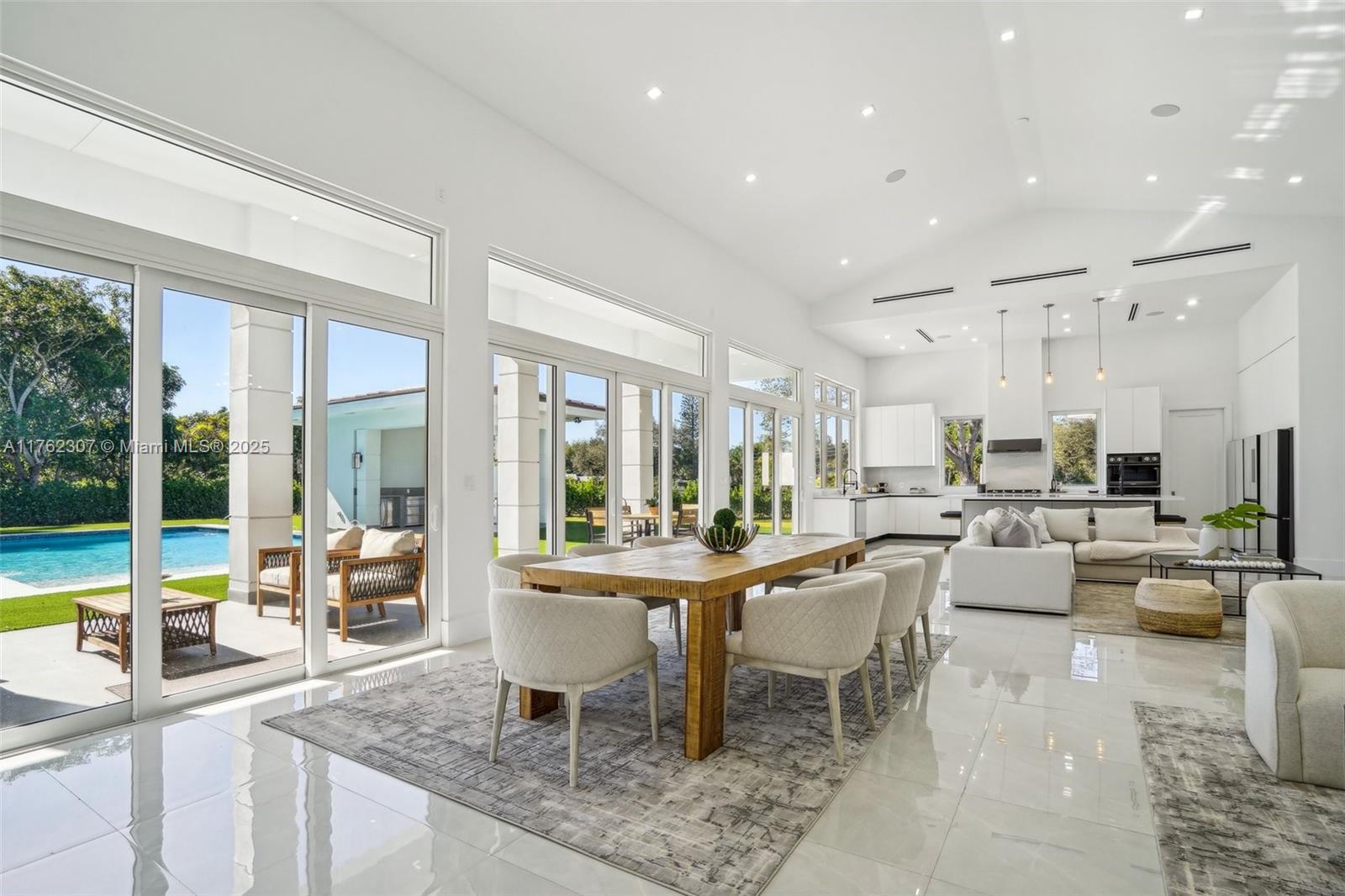 Welcome to a brand-new 6-bed, 7-bath contemporary smart home spanning Florida life style in every corner. Features include a very illuminated open floor plan, gourmet kitchen, private suites with walk-in closets, and a stunning outdoor space with a heated pool and gazebo with BBQ and full bathroom to enjoy Florida weather all year long. As additional perks you will find extra large laundry room and 2-car under air garage plus plenty of parking. Located in a prime neighborhood, this home blends modern luxury with convenience. close to Baptist Hospital, Dadeland Mall, Riviera Preparatory, Columbus HS and Saint Thomas. Perfect place to call home.
