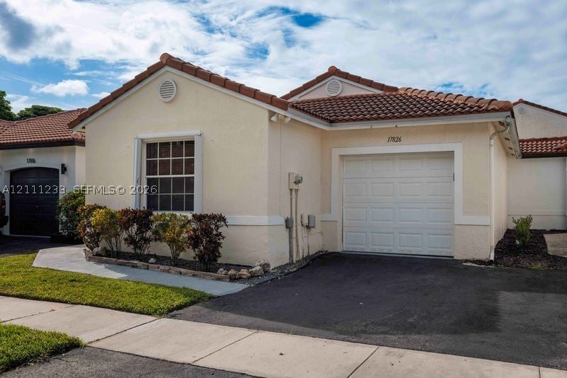 Photo of 17826 SW 10th Ln, Pembroke Pines, FL 33029 (MLS # A12111233)