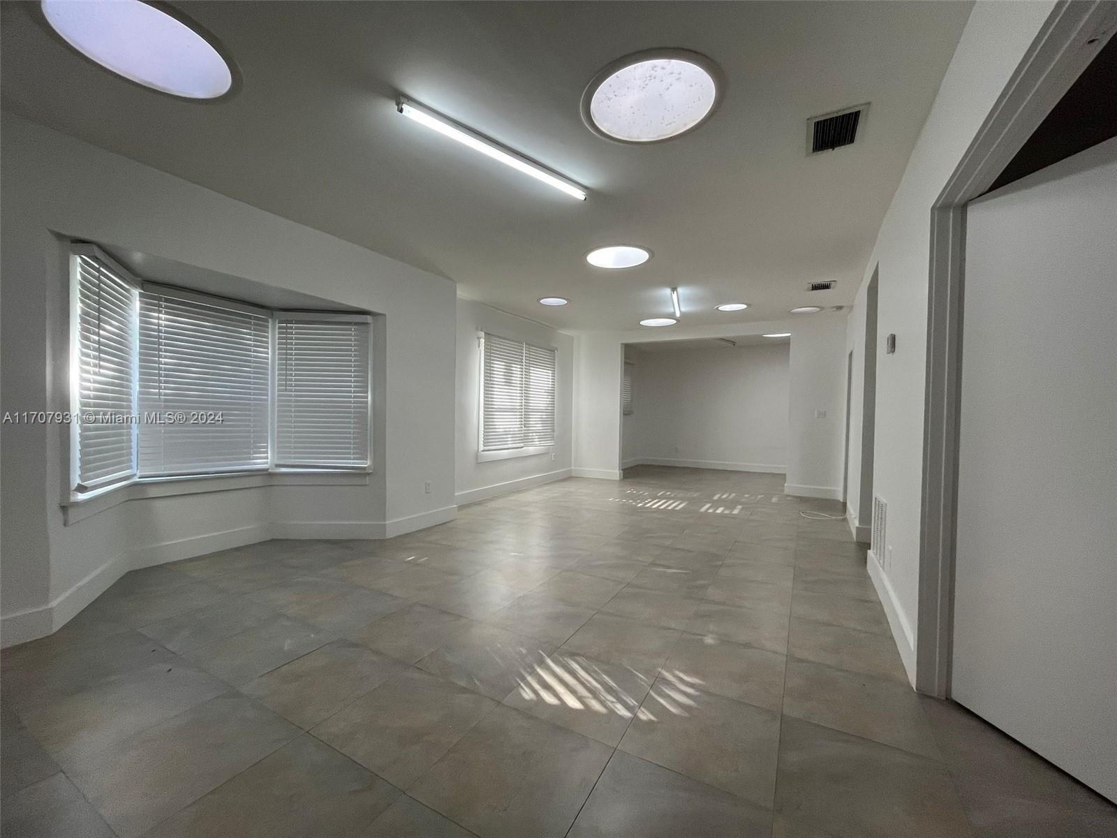 Excellent 3/1 single family home opportunity to rent in the heart of Wynwood. New roof, new windows, new bathroom, new kitchen. Central AC unit. Modern Skylights for natural day lights. Very private, ready to move in. Very nice corner property. Great, bright and ample space, easy to show. Has a nice Fenced patio. Very easy for you to park outside. No subleasing. Parking on the street. Two months of deposit and the first month of rent.