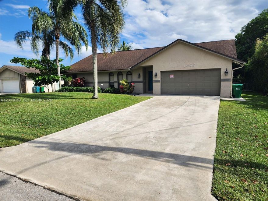 Located in sought-after Plantation Acres, this beautiful 4-bedroom, 2-bath home offers a rare blend of comfort, privacy, and everyday luxury. Clean, well kept, and free of odors, the home feels fresh, welcoming, and exceptionally comfortable from the moment you walk in.

Inside, the layout is ideal for both daily living and entertaining. The open kitchen and family room create a warm, functional flow, and all appliances are clean and well maintained. The dining room transitions seamlessly to a covered patio beside the swimming pool, creating a wonderful indoor-outdoor setting for relaxing or hosting guests.

The primary suite features vaulted ceilings and a walk-in closet, adding to the home’s spacious and refined feel. Outside, the backyard is truly gorgeous—perfect for family fun, highly private, and surrounded by tall, mature greenery that creates a secluded and peaceful atmosphere.

Additional features include solar panels for energy efficiency, a 2-car garage, and generous storage throughout.

This is a clean, luxurious, and very comfortable home in one of Plantation’s most desirable communities, offering the perfect setting for relaxed family living and elegant entertaining.