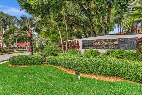 Photo of 671 S Hollybrook Dr #209, Pembroke Pines, FL 33025 (MLS # A12046927)