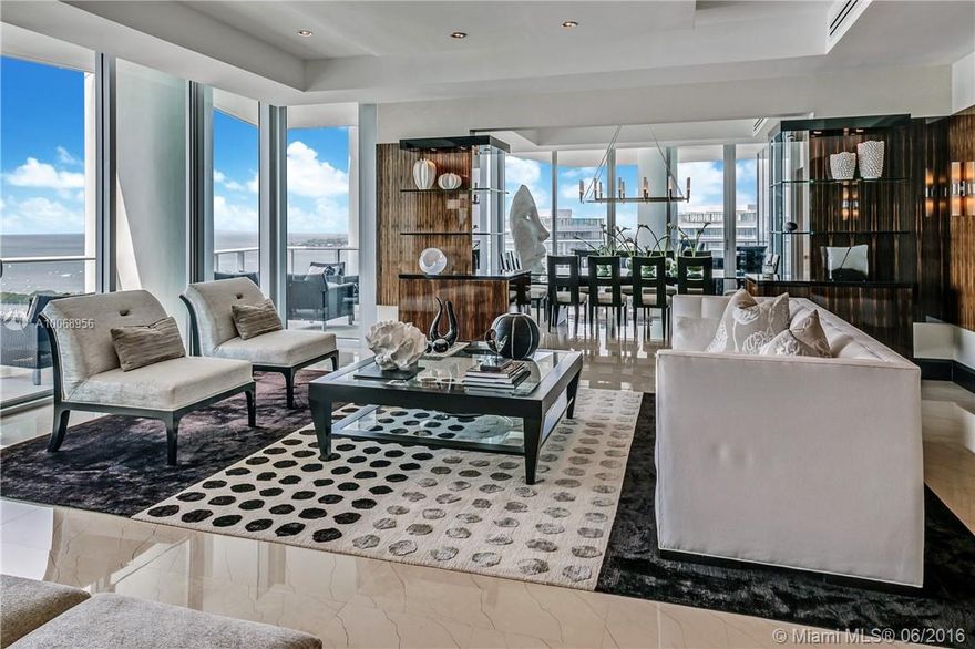 Breathtaking, timeless, impressive, fresh and elegant PH, located in the exclusive Grovenor House. Masterful design and modern luxury are uniquely embodied in this 5 bed 6.2 bath with 6,920 SF LA. Panoramic unobstructed WF & city views 22.5 ft terraces. Residence graced by Italian tiger marble floors, 11ft ceilings, divine master suite with sitting area, his & hers baths, Creston audio-visual system, custom furniture by Brett Sugarman & Steven G. Other highlights include world class amenities & 3 car gr
