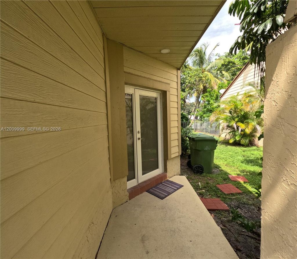 Photo of 1211 SW 84th Ter #1211, Pembroke Pines, FL 33025 (MLS # A12009999)