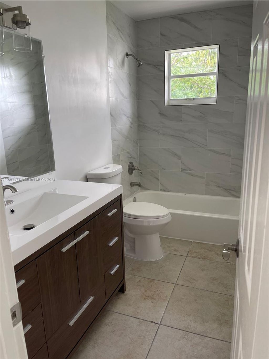 Photo of 2410 Sherman St #S, Hollywood, FL 33020 (MLS # A11683977)