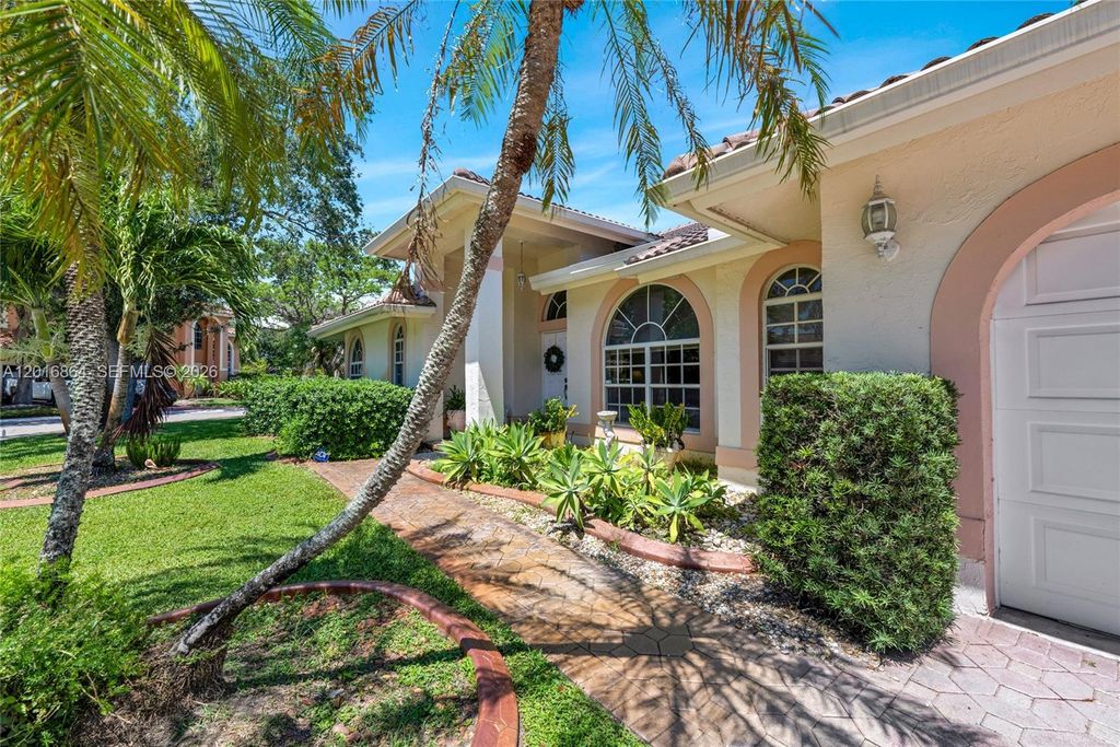 Photo of 701 SW 93rd Ter, Pembroke Pines, FL 33025 (MLS # A12016864)